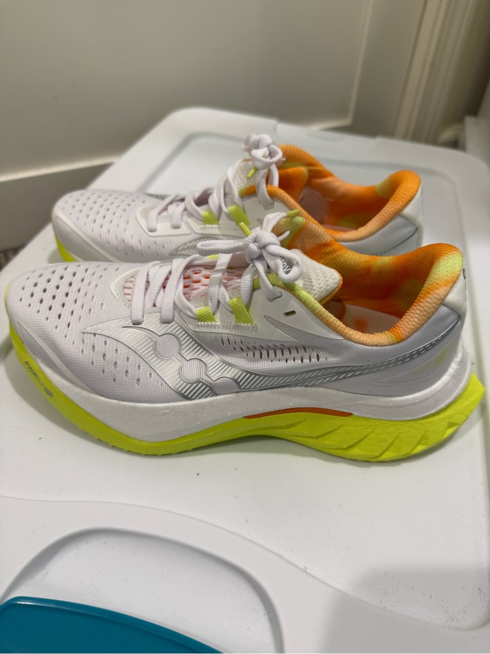 Saucony Women's White Running Shoes with Neon Yellow & Orange Accents